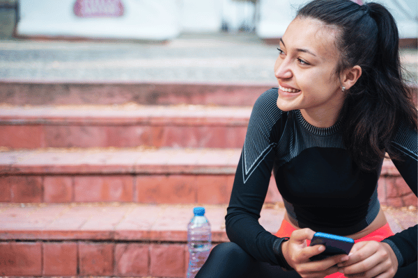 Girl monitoring her teeth straightening progress remotely