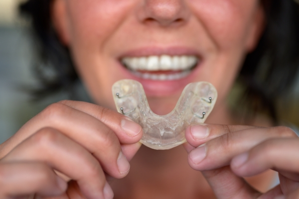  Woman wearing a mouth guard 