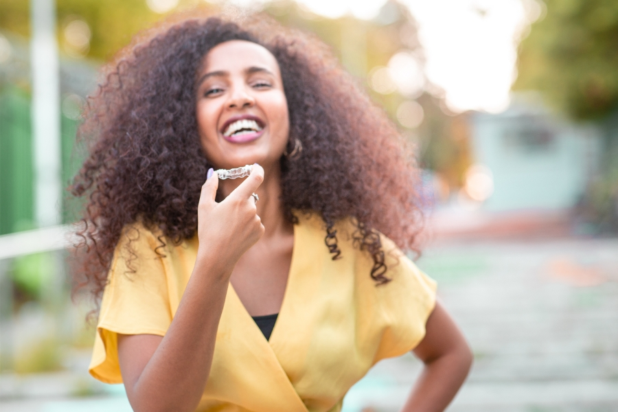 A confident smile with clear aligners