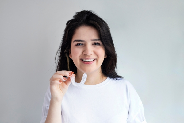 Smiling Happily with Clear Aligners